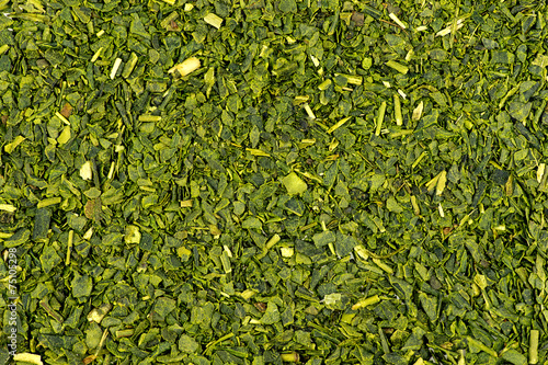 Macro of dried green tea background texture