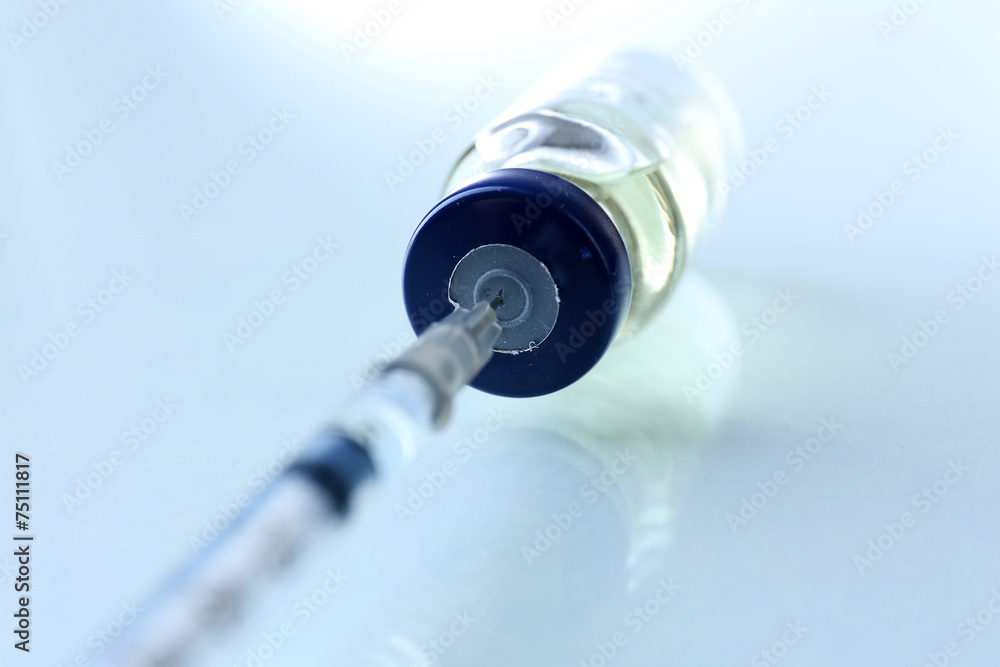 Vaccine in vial with syringe Vaccine in vial with syringe