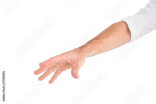 Businessman holding his hand out