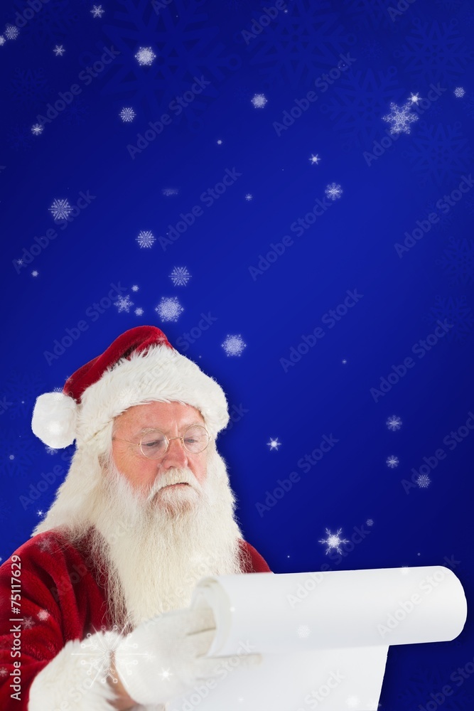 Composite image of santa claus checking his list Composite image of santa claus checking his list