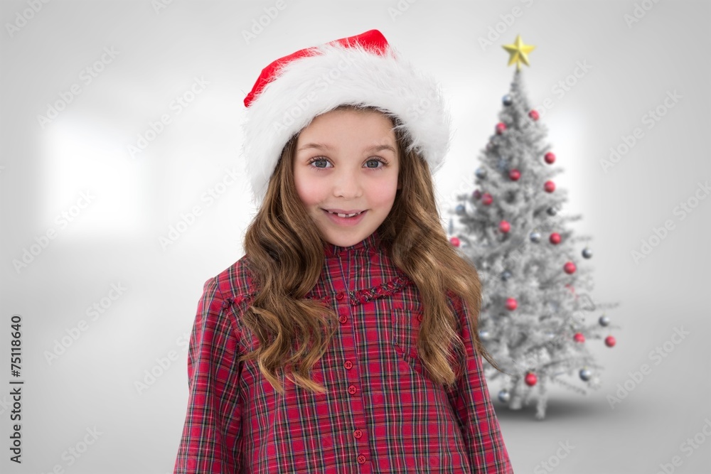 Composite image of cute girl in santa hat Composite image of cute girl in santa hat