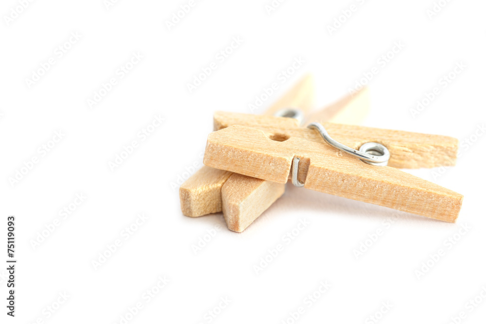 Wooden clothes peg isolated on white background Wooden clothes peg isolated on white background