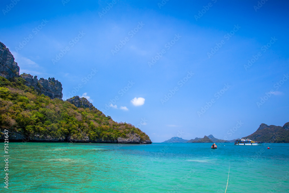 Long boat and ship in the sea of island Long boat and ship in the sea of island