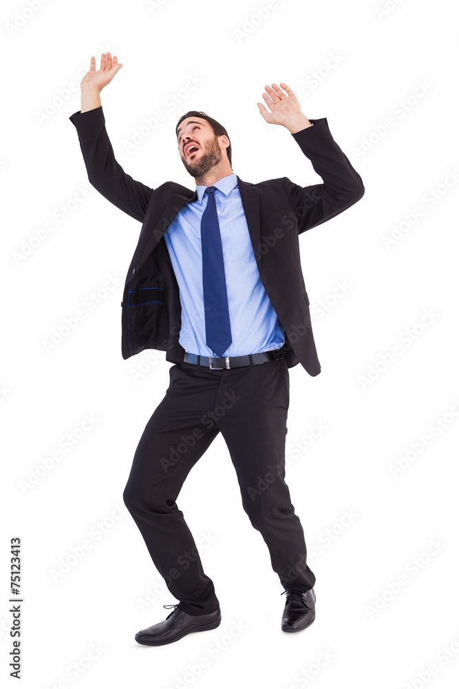 Shocked businessman standing and pushing up Shocked businessman standing and pushing up
