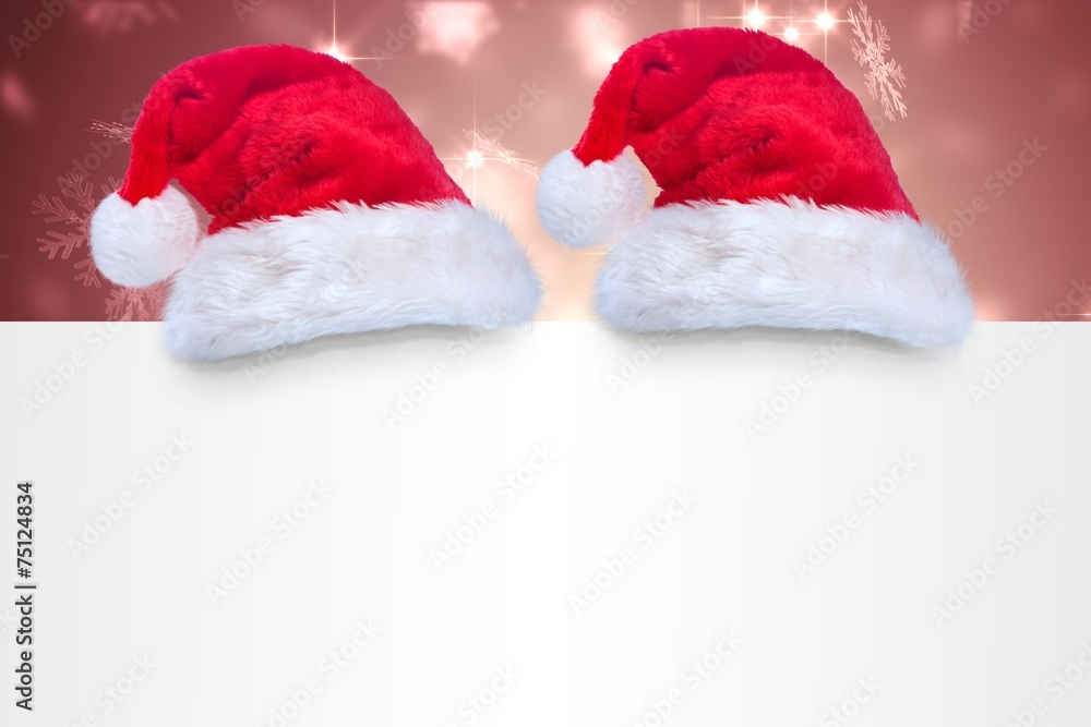 Composite image of santa hat on poster Composite image of santa hat on poster