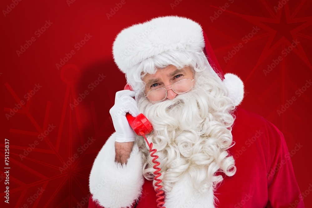 Composite image of santa claus on the phone Composite image of santa claus on the phone