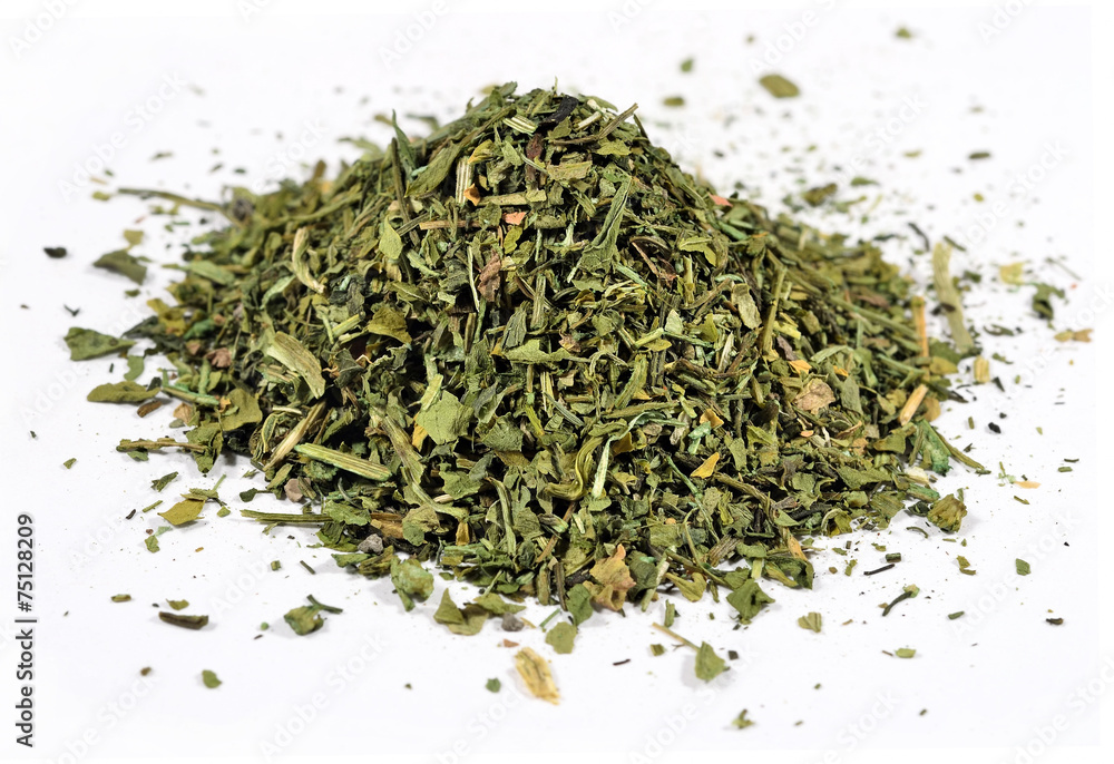 Heap of dried parsley on a white Heap of dried parsley on a white