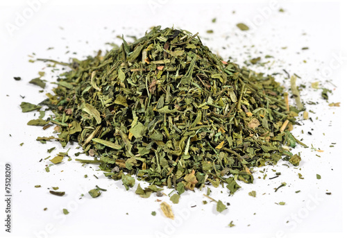 Heap of dried parsley on a white