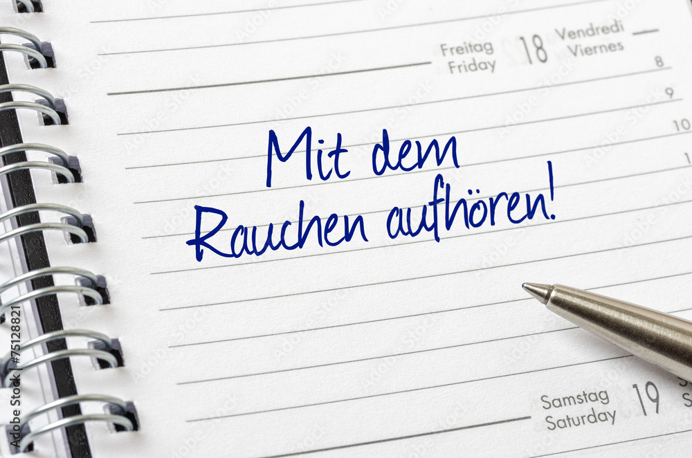 Terminkalender mit dem Eintrag Mit dem Rauchen aufhören Terminkalender mit dem Eintrag Mit dem Rauchen aufhören