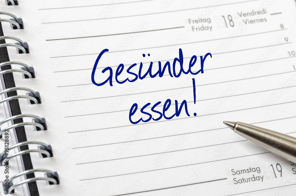 Terminkalender mit dem Eintrag Gesünder essen Terminkalender mit dem Eintrag Gesünder essen