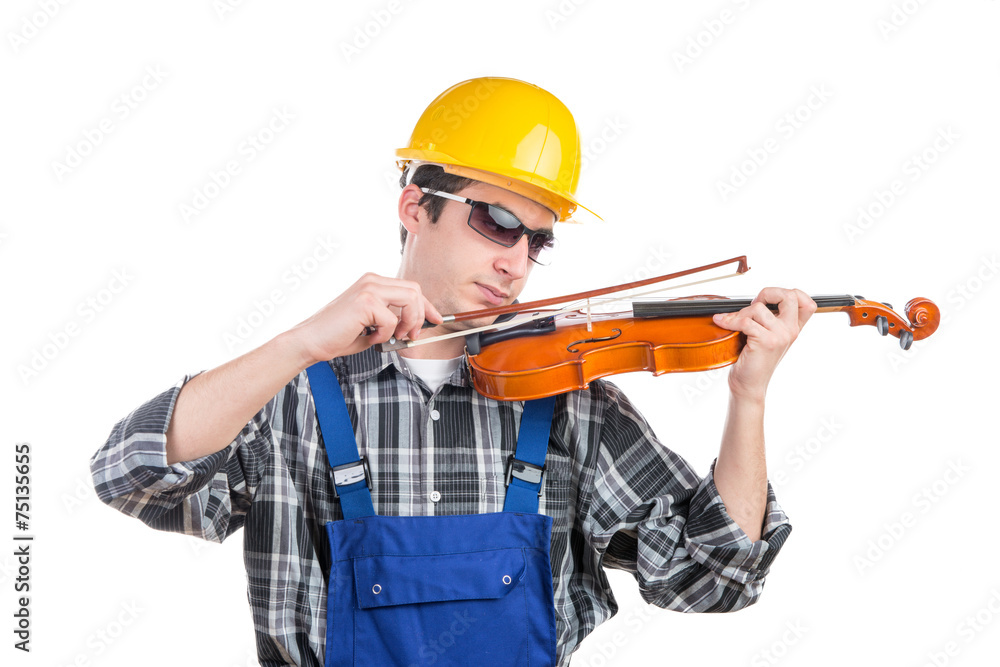 a young worker plays the violin a young worker plays the violin