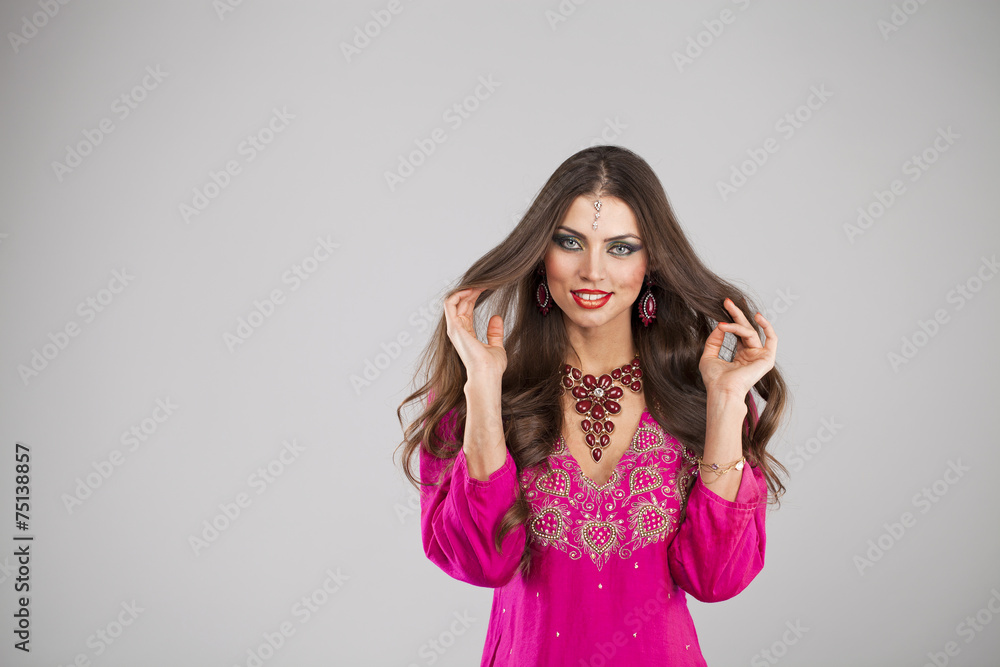Young pretty woman in indian red dress Young pretty woman in indian red dress