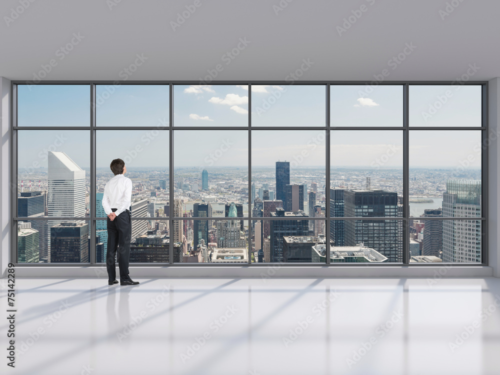 businessman standing in modern office