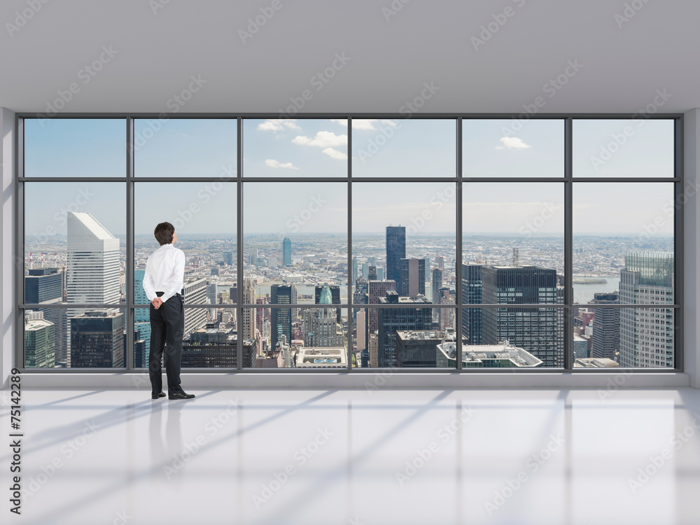 Fototapeta premium businessman standing in modern office