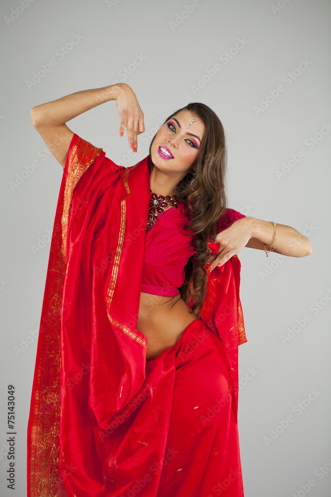 Young pretty woman in indian red dress Young pretty woman in indian red dress