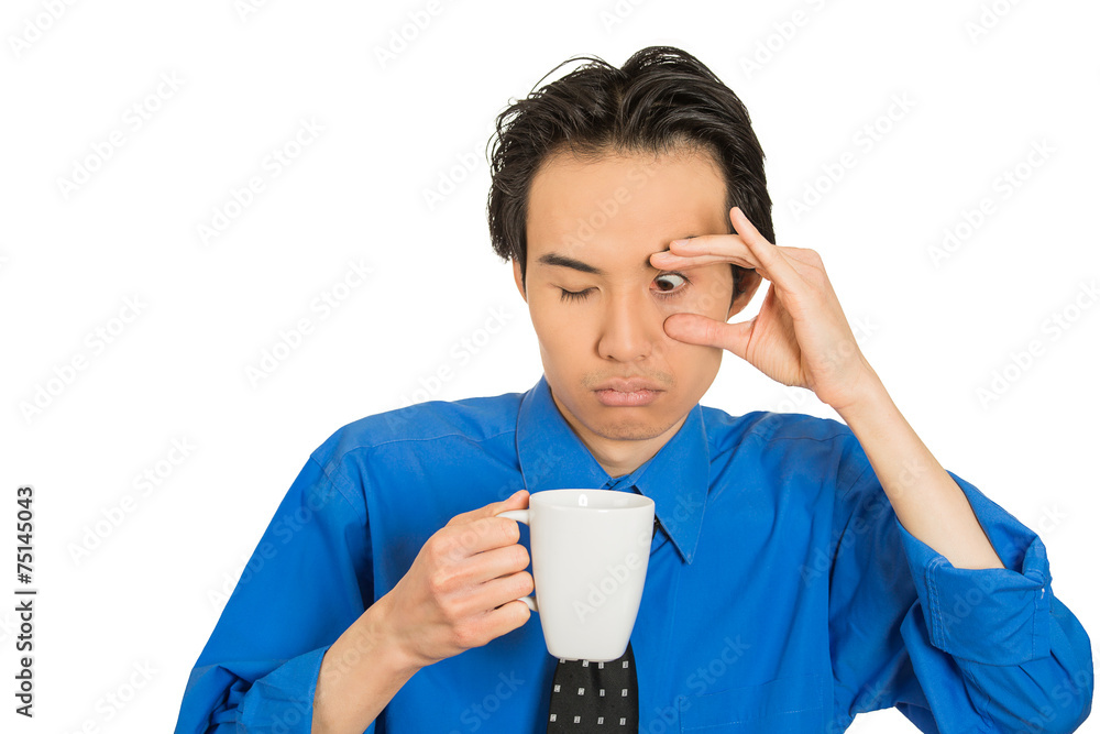 tired falling asleep young businessman holding cup of coffee tired falling asleep young businessman holding cup of coffee