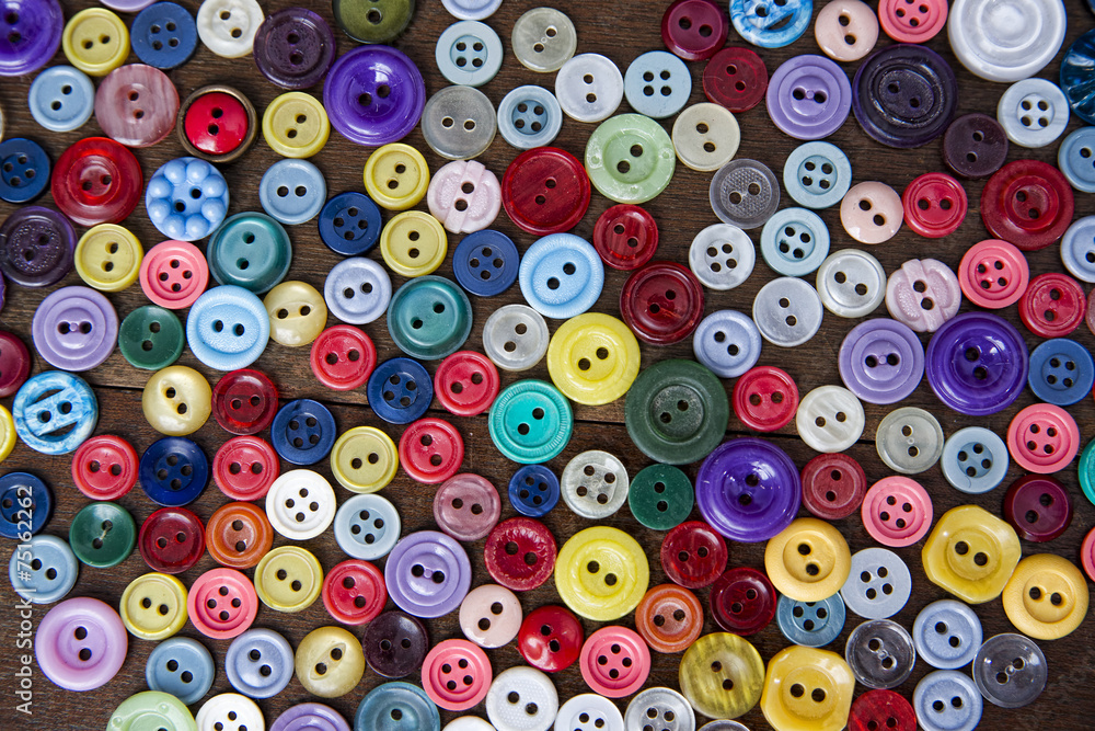 Many buttons of various shapes and colors Many buttons of various shapes and colors