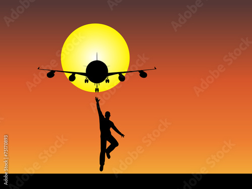 Man silhouette with plane at sunset