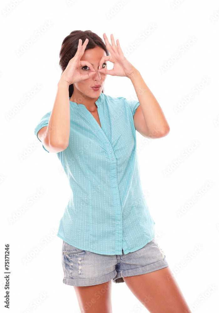 Pretty female in short jeans gesturing glasses Pretty female in short jeans gesturing glasses