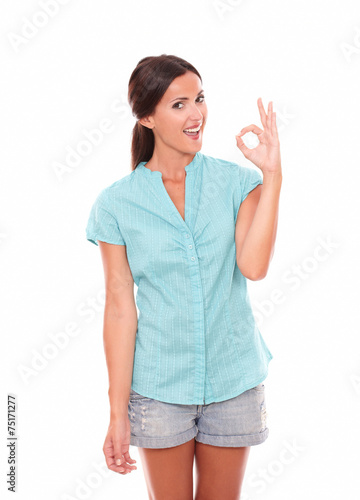 Happy hispanic female gesturing a great job