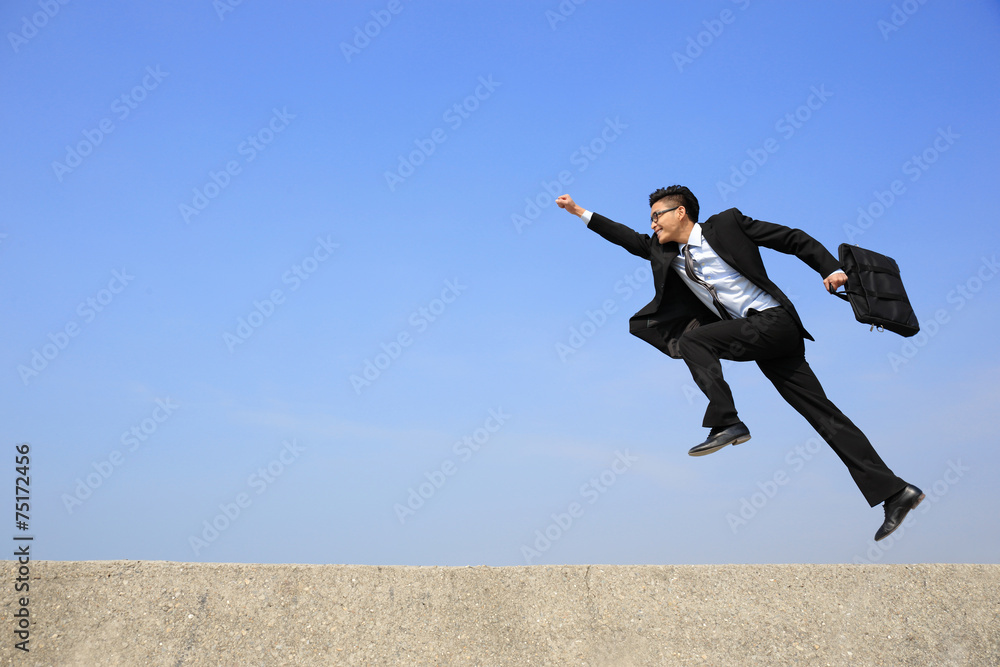 Happy business man run