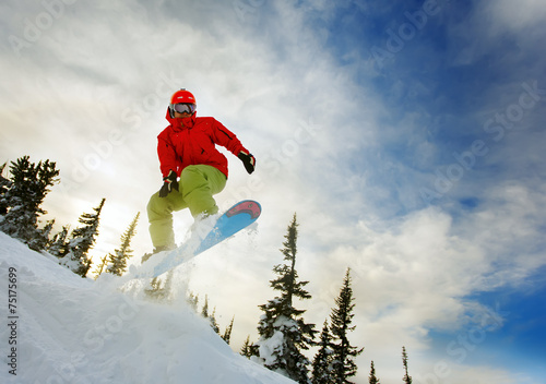 Snowboarder jumping