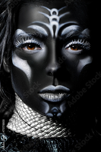Close-up portrait of a woman with creative make-up © olgamaer