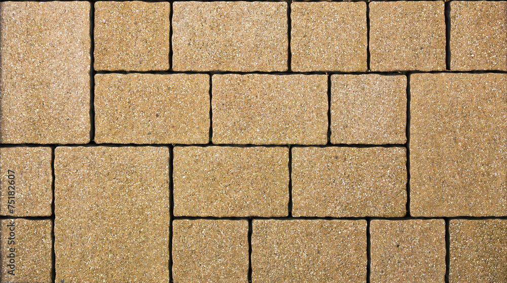 Fototapeta premium A yellow concrete pavement texture