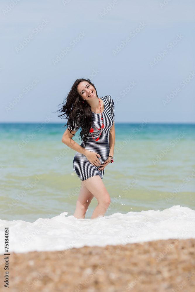 Pregnant woman on the beach Pregnant woman on the beach