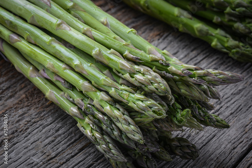 Fresh Asparagus on Rustic Wood Background