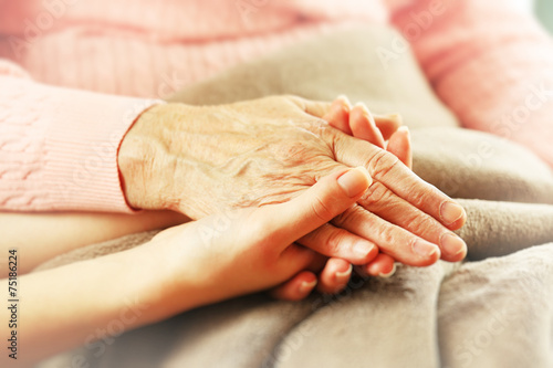 Fotografía Helping hands, care for the elderly concept