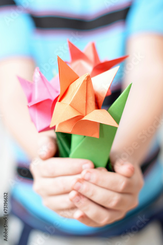 Bouquet of tulips in children's hands