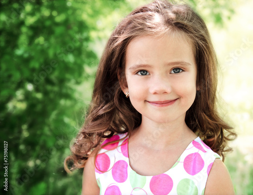 Portrait of adorable smiling little girl © svetamart