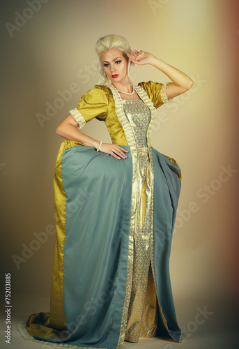 Haughty queen in royal dress