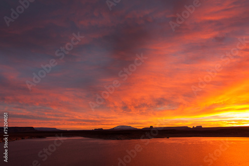 Lake Powell at sunrise  clouds and sunlight