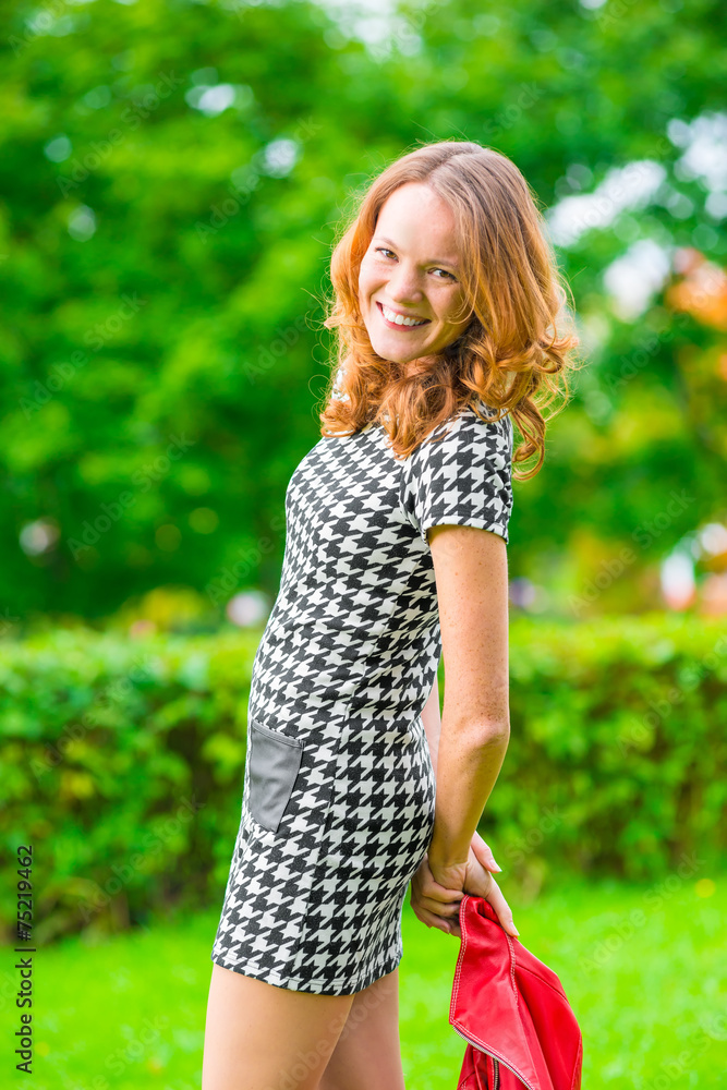 Portrait of a cheerful girl with red hair Portrait of a cheerful girl with red hair