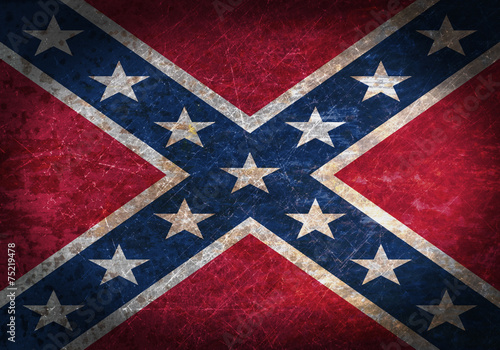 Old rusty metal sign with a flag