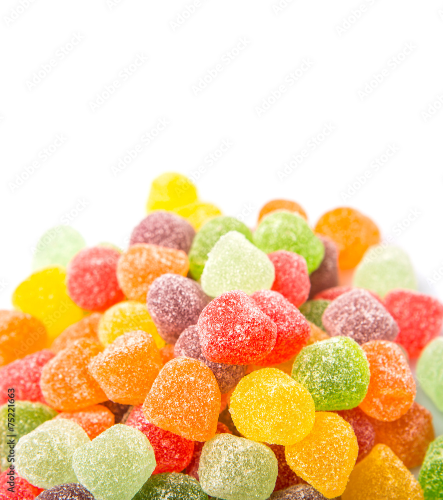 Colorful mix sugar jelly candy over white background Colorful mix sugar jelly candy over white background