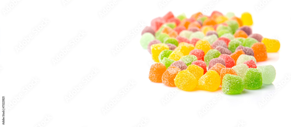 Colorful mix sugar jelly candy over white background Colorful mix sugar jelly candy over white background