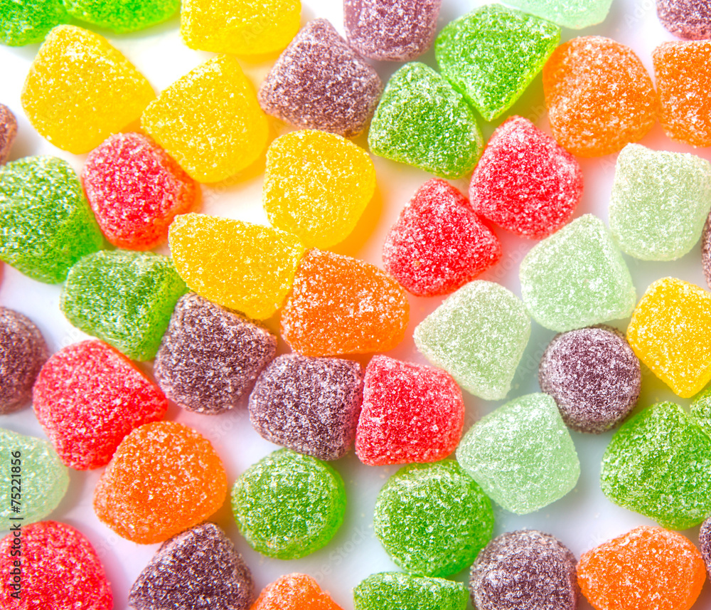 Colorful mix sugar jelly candy over white background Colorful mix sugar jelly candy over white background