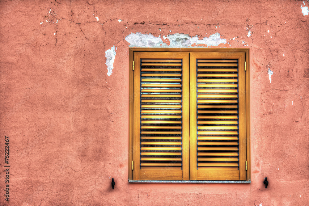 rustic window in a pink wall