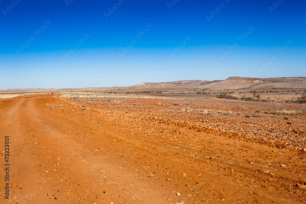 Road through the remote Australian outback.