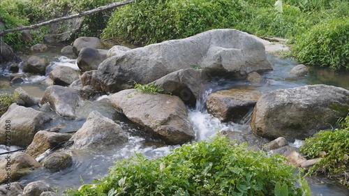 Natural waterway with big rock  in upcontry of Thailand photo