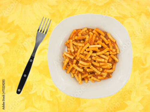 Inexpensive meal on plate with fork