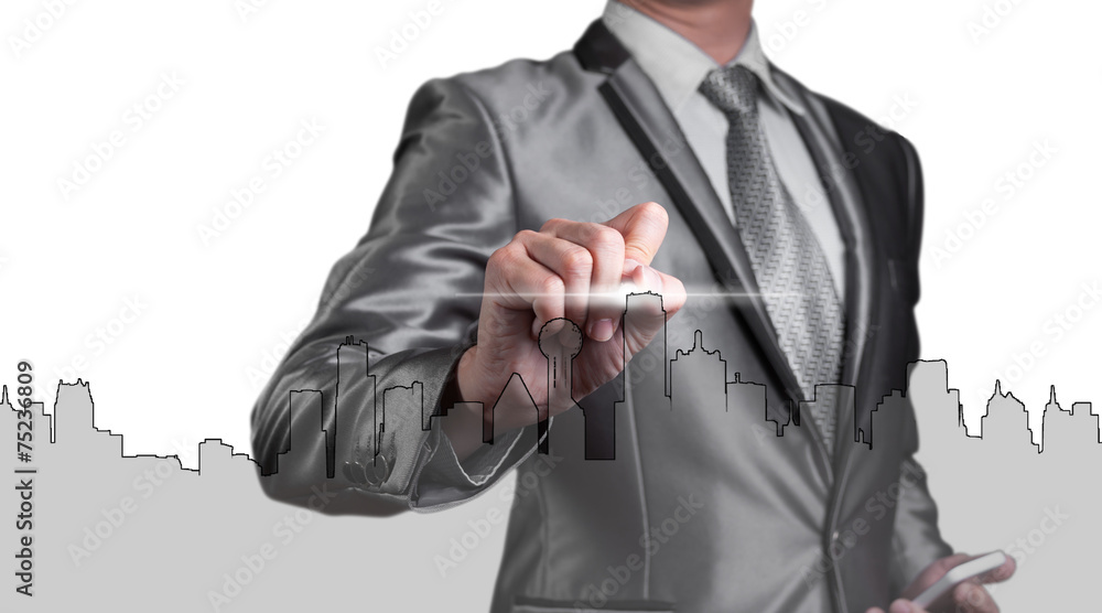 Fototapeta premium businessman drawing city line, business concept