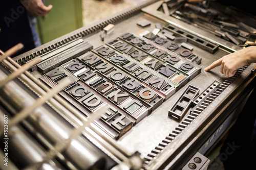 Old typography printing machine photo