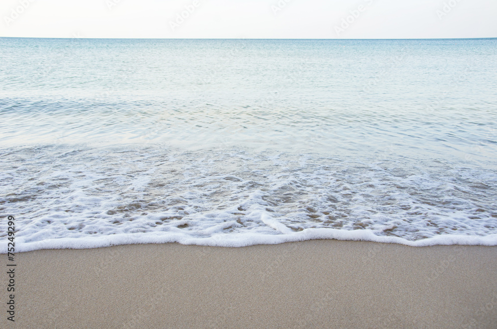 Sand beach with wave