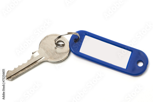 Key with blue trinket isolated © Sergey Ryzhov