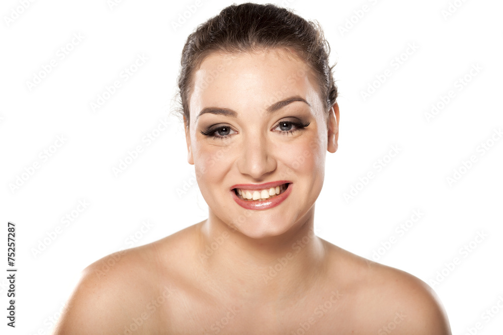 Obraz premium happy young woman on a white background