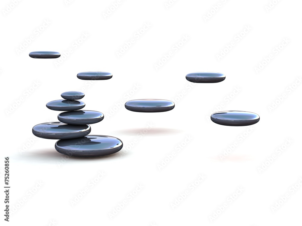 Pebbles stacked on each other on a white background Pebbles stacked on each other on a white background